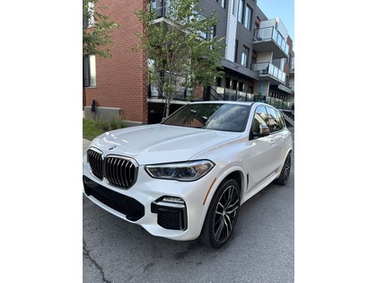 BMW X5 M50i 4D Utility